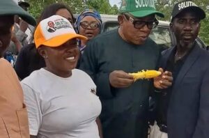 Oyo ADC Governorship Candidate Sparks Reactions After Sharing Boiled Corn to Supporters